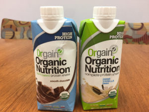 Orgain brand nutritional supplements in eating disorder recovery in Los Angeles, California [Image description: photo of chocolate and vanilla orgain shake bottles]