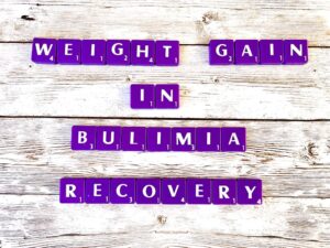 Weight gain in bulimia recovery in Los Angeles, California [Image description: purple scrabble tiles spelling "Weight gain in bulimia recovery"]