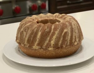 Nana's Poundcake [image description: a round pound cake on a plate]