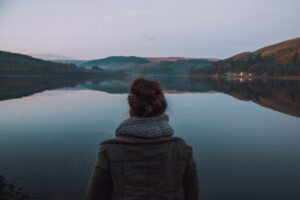 Anxiety During Anxious Times in Los Angeles, California [Image description: image of the back of a person looking at a calm body of water] Represents a person getting counseling for anxiety in Los Angeles, California 