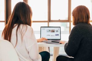 FBT by Telehealth in California [Image description: photo of a teen and a parent looking at a computer screen] Represent a teen and a parent receiving online family-based treatment for an eating disorder in California 