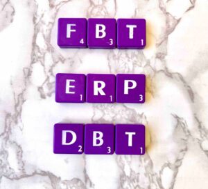 FBT, ERP, DBT, Adding other therapies to FBT for eating disorders in California [Image description: purple scrabble tiles that spell "FBT, ERP, DBT"]