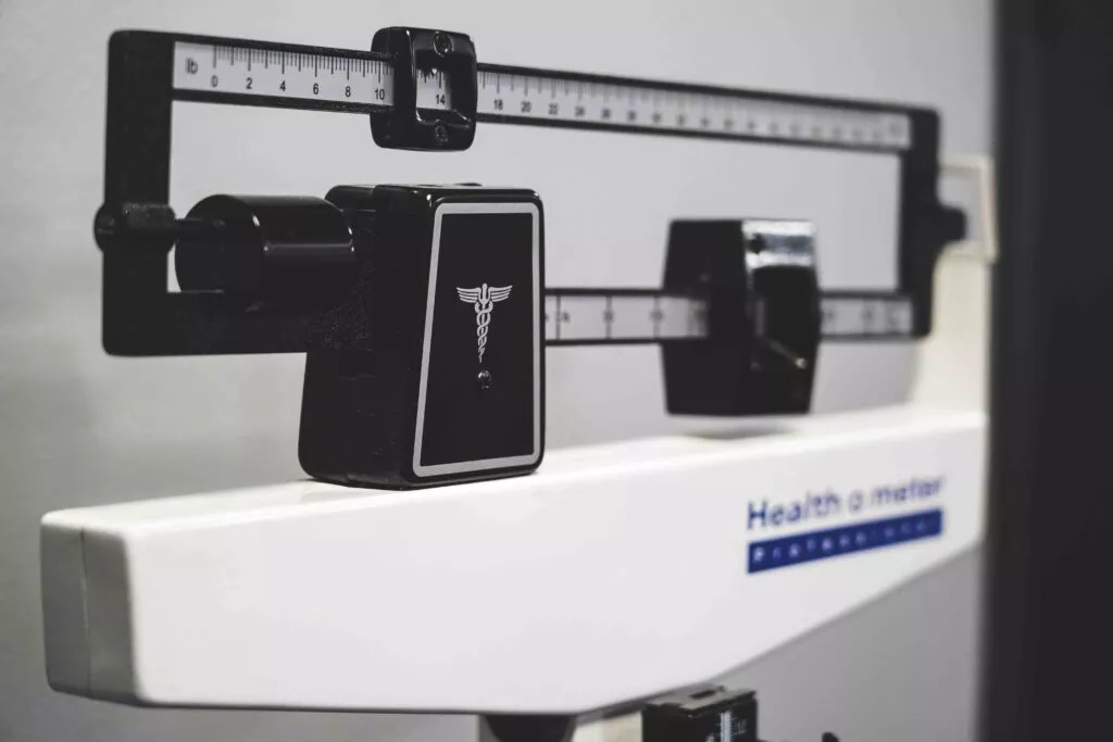 Recovery Weight [Image description: doctor scale] How we set recovery weights in eating disorder treatment