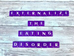 Externalize the Eating Disorder in Eating Disorder Counseling in Los Angeles, California [Image description: purple scrabble tiles spelling: "Externalize the Eating Disorder"]