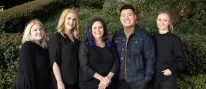 Eating Disorder Therapist team at Eating Disorder Therapy LA in Los Angeles, California [Image description: image of 5 therapists standing in front of building] 