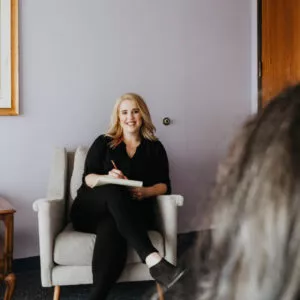 Eating Disorder Clinical Consultation and Training for CEDS [Image description: 2 people sitting in therapy chairs represent a potential eating disorder consultation with a specialist therapist at EDTLA]