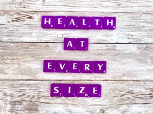Health at Every Size at Eating Disorder Therapy LA in Los Angeles, California [Image description: purple scrabble tiles spelling "Health at Every Size"]