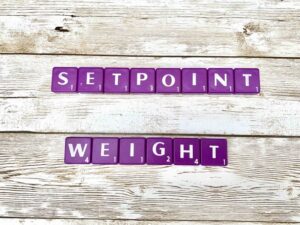 Setpoint Weight and Eating Disorder Counseling in Los Angeles, California [Image description: purple scrabble tiles spelling "Setpoint Weight"]