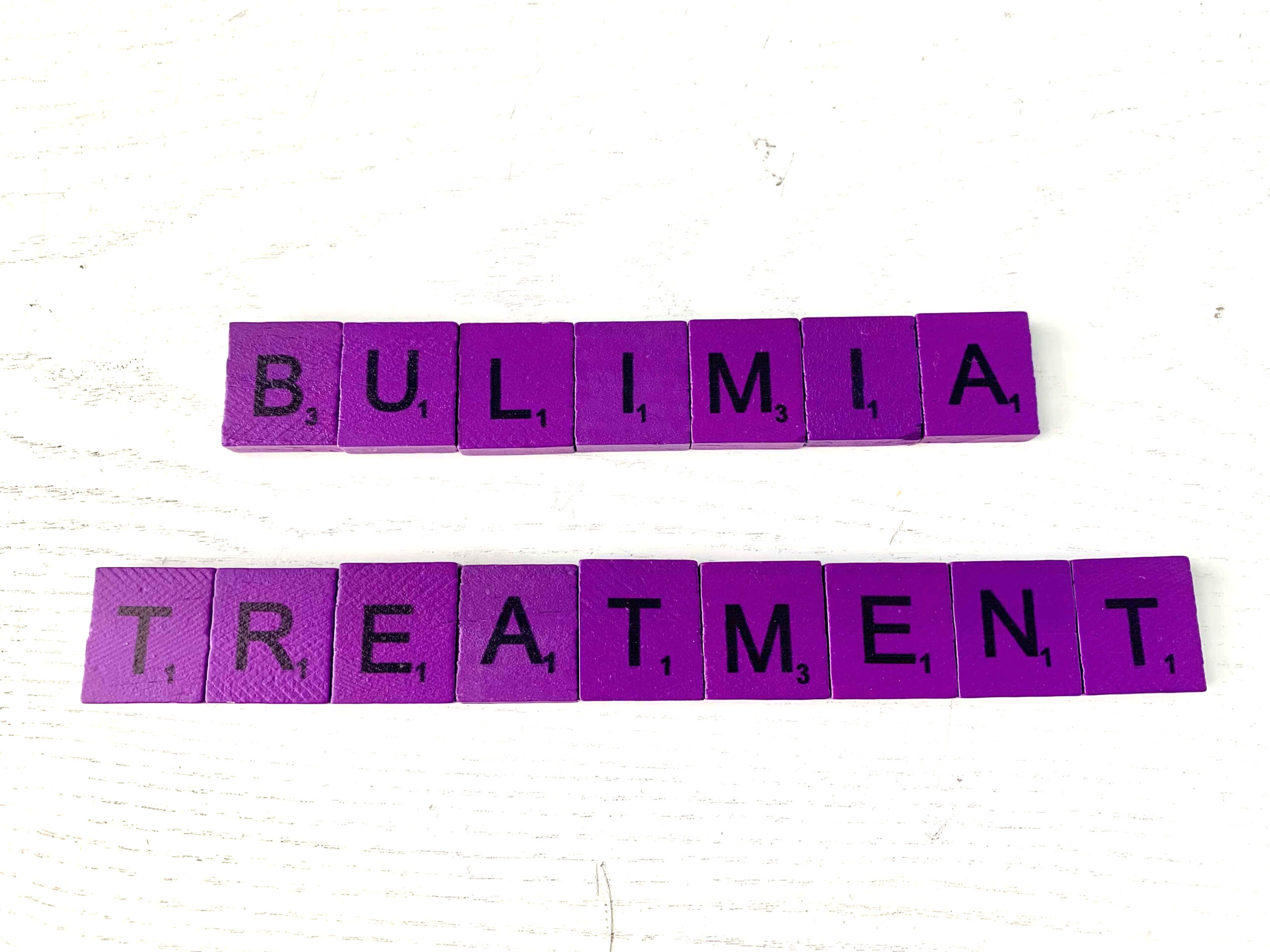 Bulimia Treatment in Los Angeles, CA [Image description: purple scrabble tiles spelling "Bulimia Treatment"]