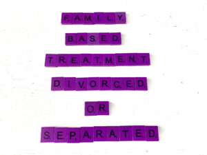Family-Based Treatment for Divorced and Separated Families [Image description: Purple scrabble tiles that spell "Family Based Treatment Divorced or Separated"]