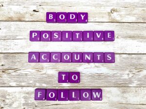Body Positive Instagram Accounts to Follow [Image description: purple scrabble tiles spelling "Body Positive Accounts to Follow"] for people in eating disorder recovery in Los Angeles, California