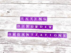 Eating Disorder Organizations in the US Supporting Diverse Bodies [Image description: purple scrabble tiles spelling "Eating Disorder Organizations"]