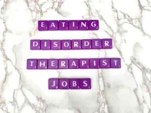 Eating disorder therapist jobs in Los Angeles at Eating Disorder Therapy LA [Image description: purple scrabble tiles spelling "Eating Disorder Therapist Jobs"]