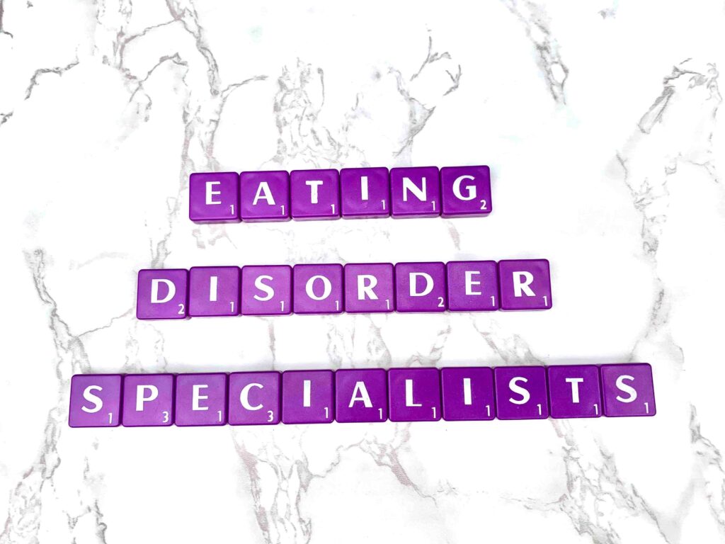 Eating Disorder Specialist Counselors at Eating Disorder Therapy LA in Los Angeles, California [Image description: purple scrabble tiles spelling "Eating Disorder Specialists"]