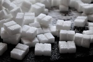 Sugar Addiction versus Eating Disorder [Image description: photo of cubes of sugar]